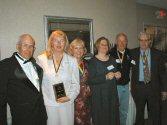 Brian Johnson presenting Race Team awards to Sylvia Scott, Mary Ellen Haggerty, Mary Diner, Rick Adams and King Jobson