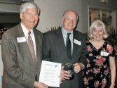 Keith Nelson presenting President's Award to Gary Gray, with Mary Ellen Gabel